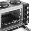 Mini piekarnik z otwartymi drzwiczkami, widoczne pokrętła i ruszt wewnątrz. Na górze znajdują się dwie płyty grzewcze.