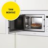 Kuchenka mikrofalowa w zabudowie z otwartymi drzwiczkami, wewnątrz której znajduje się talerz z jedzeniem. Na żółtym okręgu widnieje napis "TANI MONTAŻ".