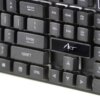 Zbliżenie na czarną klawiaturę z widocznymi klawiszami, takimi jak "BACK", "INS", "DEL", "END", "ENTER", "SHIFT", "CTRL" oraz logo "ART" na klawiszu spacji. Klawisze mają białe oznaczenia na ciemnym tle.