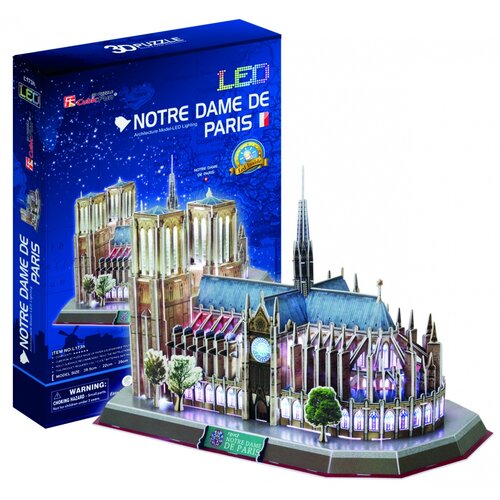 Pudełko przedstawia model 3D katedry Notre Dame w Paryżu z efektem LED, z napisem "NOTRE DAME DE PARIS" oraz flagą Francji. Na modelu widnieje tabliczka z napisem "FRANCE NOTRE DAME DE PARIS", a na pudełku znajduje się logo "Cubic Fun" oraz ostrzeżenie o 