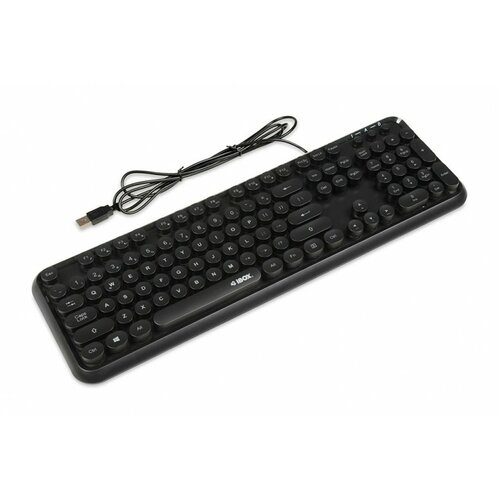 Czarna klawiatura przewodowa z okrągłymi klawiszami, na której widoczne jest logo "I-BOX" na środku. Klawiatura posiada podłączony kabel USB.