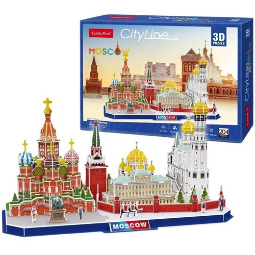 Na zdjęciu znajduje się zestaw puzzli 3D przedstawiający panoramę Moskwy, z charakterystycznymi budowlami, takimi jak cerkwie z kolorowymi kopułami. Na opakowaniu widnieje napis "CubicFun CityLine Moscow 3D Puzzle" oraz informacja o liczbie elementów: "20