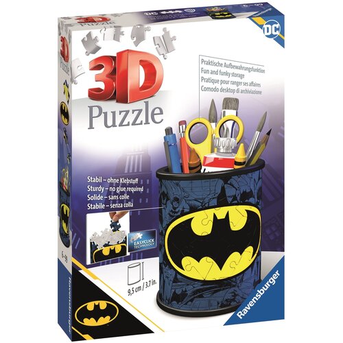 Pudełko przedstawia produkt "Puzzle 3D RAVENSBURGER Batman Przybornik 11275 (54 elementy)" z grafiką przybornika ozdobionego motywem Batmana. Na opakowaniu widnieją napisy: "3D Puzzle", "Stabil – ohne Klebstoff", "Sturdy – no glue required", "Solide – san