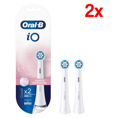 Opakowanie zawiera dwie białe końcówki do szczoteczki z niebieskimi i białymi włóknami, obok widoczny jest napis "Oral-B iO SANFTE REINIGUNG". W prawym górnym rogu znajduje się czerwony napis "2x".