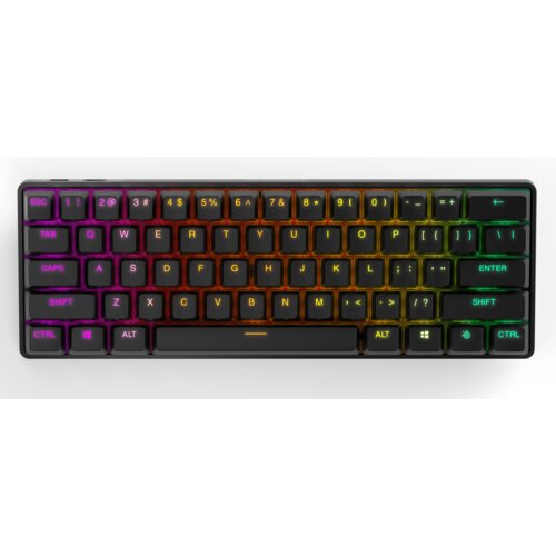 Klawiatura mechaniczna z podświetleniem RGB, na której widoczne są klawisze z oznaczeniami liter, cyfr i symboli, w tym ESC, TAB, CAPS, SHIFT, CTRL, ALT, ENTER. Klawisze są podświetlone w różnych kolorach, tworząc gradient od fioletowego przez pomarańczowy do zielonego.