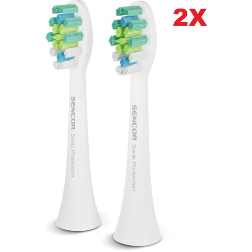 Dwie białe końcówki szczoteczki z kolorowymi włóknami, oznaczone napisem "SENCOR Sonic Protection". W prawym górnym rogu widoczny jest czerwony napis "2X".