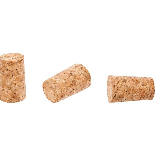 Na zdjęciu widoczne są trzy korki do butelek wykonane z naturalnego korka, ułożone w różnych pozycjach. Korki mają nieregularną, ziarnistą strukturę i jasnobrązowy kolor.