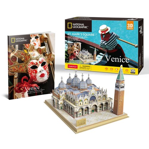 Na zdjęciu znajduje się zestaw puzzli 3D przedstawiający Plac Św. Marka w Wenecji, składający się z 107 elementów. Widoczne są również opakowanie z napisem "National Geographic", "St. Mark's Square", "Venice" oraz broszura z maską wenecką na okładce.