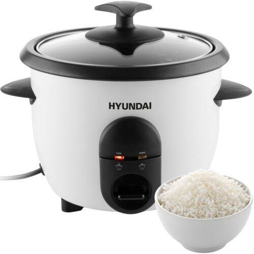 Biały ryżowar z czarną pokrywką i uchwytami, z widocznym logo "HYUNDAI" na przodzie oraz dwoma kontrolkami oznaczonymi jako "COOK" i "WARM". Obok urządzenia znajduje się miska z ugotowanym białym ryżem.