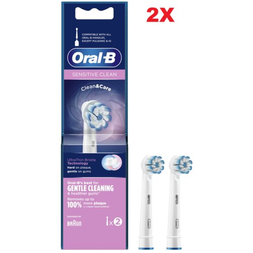 Opakowanie produktu Oral-B Sensitive Clean z dwiema końcówkami szczoteczki do zębów, z widocznym napisem "Oral-B Sensitive Clean" oraz informacją "UltraThin Bristle Technology Hard on plaque, gentle on gums". Obok opakowania znajdują się dwie końcówki szc