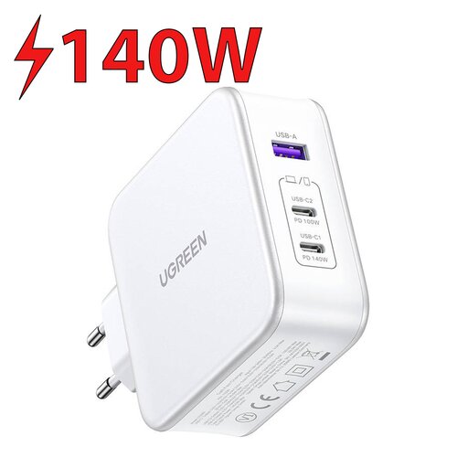 Biała ładowarka sieciowa z logo "UGREEN" posiada trzy porty: USB-A, USB-C2 z oznaczeniem "PD 100W" oraz USB-C1 z oznaczeniem "PD 140W". Nad ładowarką widnieje czerwony napis "140W" z symbolem błyskawicy.