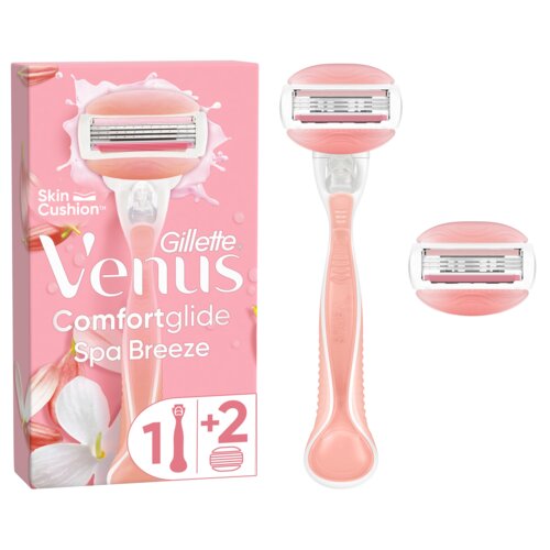 Na zdjęciu znajduje się różowe opakowanie z napisem "Gillette Venus Comfortglide Spa Breeze" oraz ilustracją golarki. Obok opakowania widoczna jest różowa golarka i dwa wymienne wkłady.