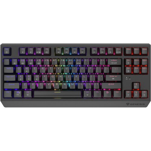 Na zdjęciu znajduje się klawiatura mechaniczna z podświetleniem RGB, posiadająca układ klawiszy QWERTY oraz dodatkowe klawisze funkcyjne. W prawym dolnym rogu widoczne jest logo "GENESIS".