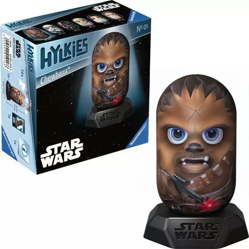 Na zdjęciu znajduje się opakowanie oraz model 3D przedstawiający postać z serii "Star Wars" o nazwie "Chewbacca". Na opakowaniu widnieje napis "Hylkies Chewbacca", "Star Wars", "Ravensburger", a także numer "Nº 05".
