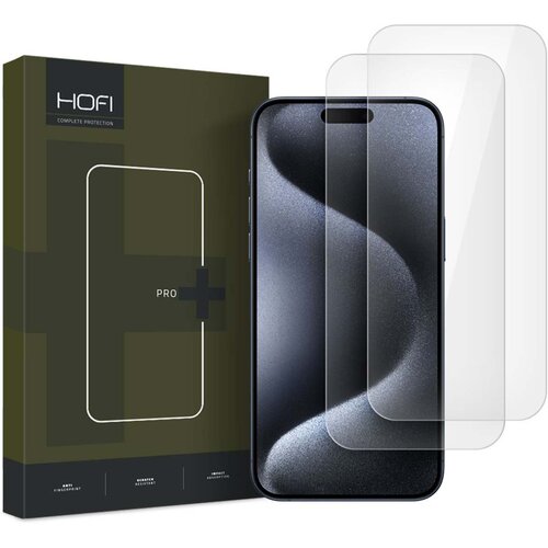 Na zdjęciu znajduje się opakowanie produktu z napisem "HOFI COMPLETE PROTECTION" oraz przezroczyste szkło hartowane na ekran telefonu. Obok opakowania widoczny jest telefon z nałożonym szkłem ochronnym, a w tle znajdują się dwa dodatkowe arkusze szkła.