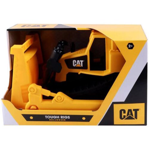 Na zdjęciu znajduje się zabawkowy spychacz w żółtym kolorze, umieszczony w opakowaniu z widocznym logo "CAT". Na opakowaniu widnieje napis "TOUGH RIGS BULLDOZER" oraz oznaczenie wiekowe "2+".