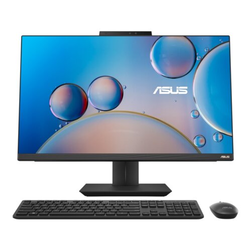 Na zdjęciu znajduje się komputer stacjonarny typu all-in-one z dużym ekranem, na którym widoczne są kolorowe bańki na niebieskim tle oraz logo "ASUS". Przed monitorem umieszczono czarną klawiaturę i myszkę.