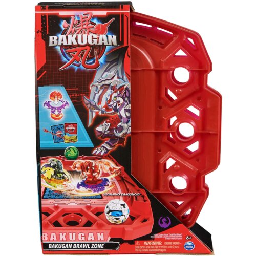 Czerwone opakowanie z grafiką przedstawiającą arenę do gry Bakugan oraz postać smoka. Widoczny tekst: "BAKUGAN BRAWL ZONE", "SPECIAL ATTACK DRAGONOID", "WARNING: CHOKING HAZARD", oraz logo producenta Spin Master.