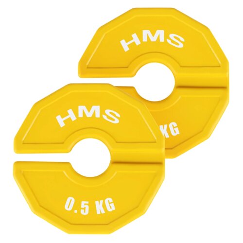 Dwa żółte obciążenia o kształcie zbliżonym do ośmiokąta, każde z napisem "HMS" oraz "0.5 KG". Obciążenia mają centralny otwór i są ułożone jedno nad drugim.
