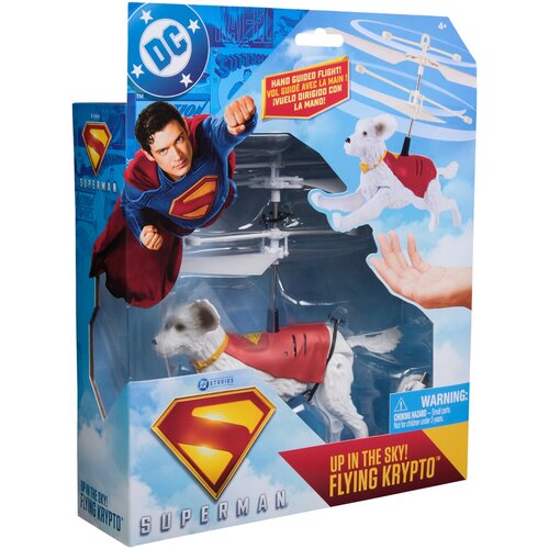 Opakowanie przedstawia figurkę psa w czerwonym płaszczu z logo Supermana, z napisem "UP IN THE SKY! FLYING KRYPTO" oraz ostrzeżeniem "CHOKING HAZARD - Small parts. Not for children under 3 years." Widoczny jest również wizerunek Supermana oraz logo DC.