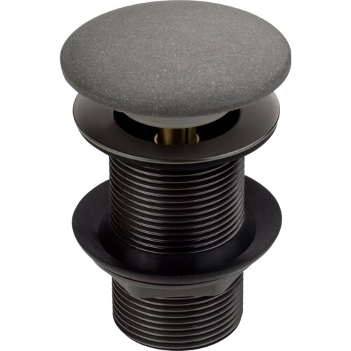 Na zdjęciu znajduje się korek do umywalki w kolorze antracyt metalik, z mechanizmem Click-Clack. Produkt ma gładką, okrągłą powierzchnię na górze i żebrowaną strukturę na dolnej części.
