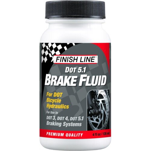 Biała butelka z czarną zakrętką, na której widnieje logo "FINISH LINE" oraz napis "DOT 5.1 BRAKE FLUID". Na etykiecie znajduje się również tekst: "For DOT Bicycle Hydraulics For Use in DOT 3, DOT 4, DOT 5.1 Braking Systems" oraz zdjęcie tarczy hamulcowej,