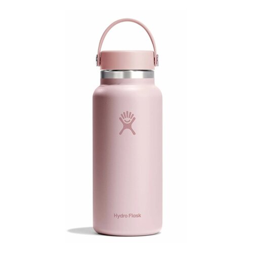 Różowa butelka termiczna z uchwytem, posiada logo w kształcie stylizowanej postaci oraz napis "Hydro Flask" na dole. Butelka ma metalowy pierścień pod nakrętką i jest w kolorze różowym.
