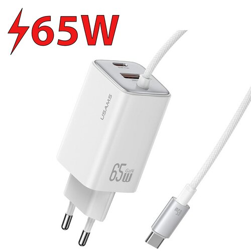 Biała ładowarka sieciowa z dwoma portami USB, oznaczona jako "USAMS" i "65W GaN", z podłączonym kablem USB-C. Na zdjęciu widoczny jest również duży napis "65W" z symbolem błyskawicy.