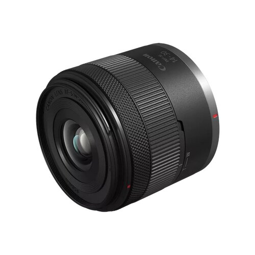 Czarny obiektyw z widocznymi napisami: "CANON LENS RF-S 14-30 mm" oraz "CANON RF-S 14-30". Obiektyw ma teksturowany pierścień i gładką powierzchnię z oznaczeniami.