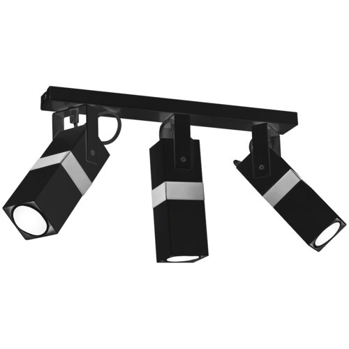 Czarna lampa sufitowa z trzema regulowanymi reflektorami o prostokątnym kształcie, każdy z nich posiada srebrny pasek. Reflektory zamontowane są na prostokątnej listwie.