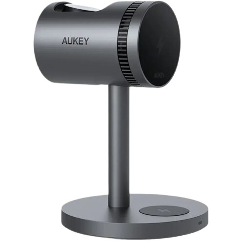 Szara ładowarka indukcyjna AUKEY LC-MC311A 3w1 Pro 15W z chłodzeniem, posiada cylindryczny kształt z logo "AUKEY" na boku. Podstawa jest okrągła z widocznym symbolem błyskawicy.