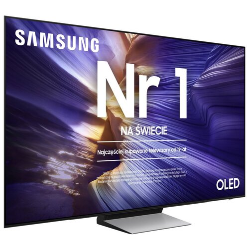 Na zdjęciu widoczny jest telewizor z logo "SAMSUNG" oraz dużym napisem "Nr 1 NA ŚWIECIE" na tle abstrakcyjnej, kolorowej grafiki. Dodatkowy tekst brzmi: "Najczęściej kupowane telewizory od 19 lat" oraz "OLED".