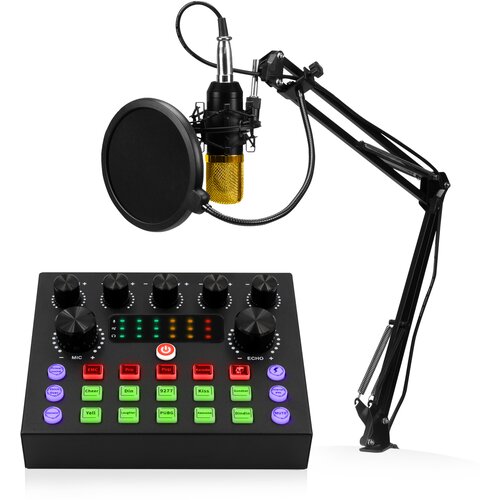 Na zdjęciu znajduje się zestaw do streamingu i karaoke składający się z mikrofonu na wysięgniku oraz panelu sterującego z różnokolorowymi przyciskami i pokrętłami. Na panelu widoczne są napisy takie jak: "EMC", "Pro", "Pop", "Cheer", "Din", "9277", "Kiss"