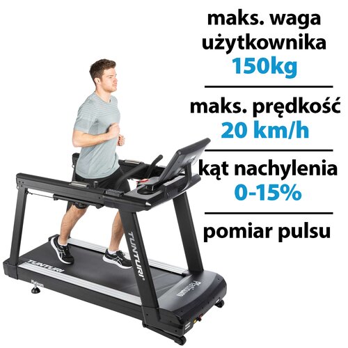 Bieżnia elektryczna z widocznym logo "TUNTURI" i "Platinum" na ramie, obok której znajdują się napisy: "maks. waga użytkownika 150kg", "maks. prędkość 20 km/h", "kąt nachylenia 0-15%", "pomiar pulsu". Na bieżni znajduje się osoba w stroju sportowym.