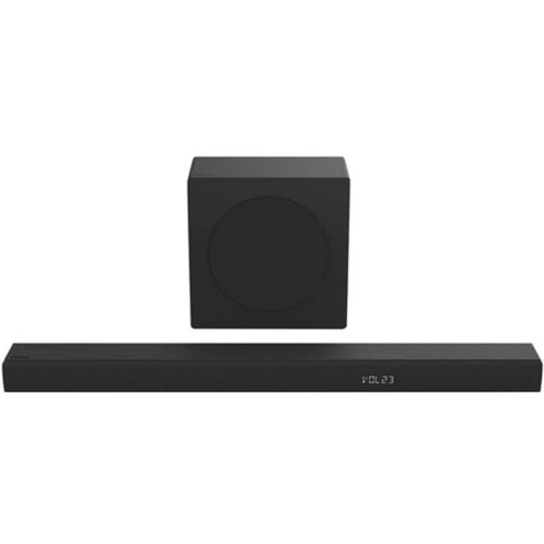 Na zdjęciu widoczny jest czarny soundbar oraz subwoofer. Na soundbarze wyświetla się napis "VOL 23".