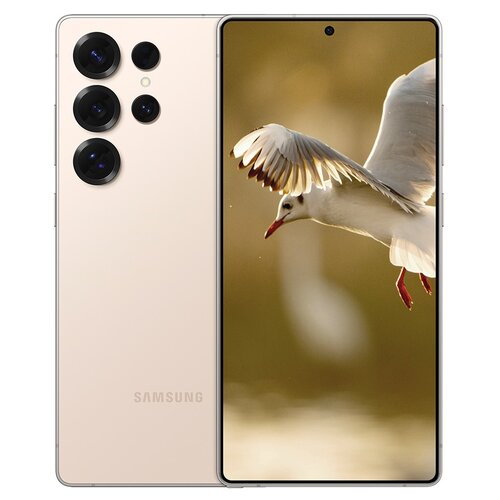 Na zdjęciu widoczny jest smartfon z trzema dużymi i jednym mniejszym obiektywem aparatu oraz ekranem, na którym wyświetlony jest obraz lecącej mewy. Na obudowie telefonu znajduje się napis "SAMSUNG".