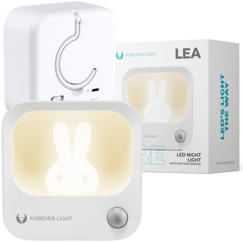 Kwadratowa lampka nocna z wizerunkiem królika, posiadająca przycisk i logo "FOREVER LIGHT" na obudowie, znajduje się obok pudełka z napisem "LEA LED NIGHT LIGHT WITH MOTION SENSOR" oraz "LED'S LIGHT THE WAY".