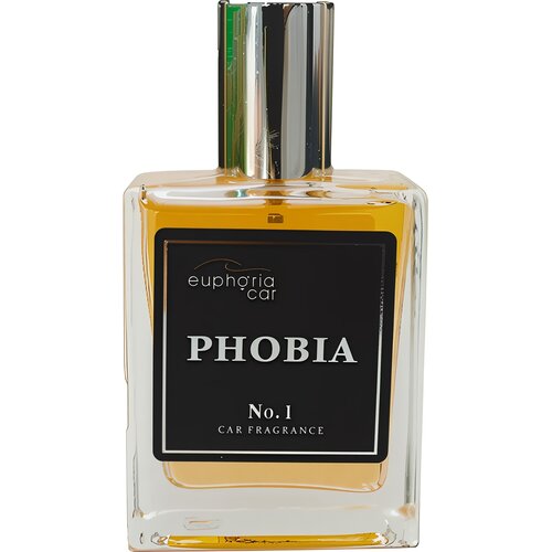 Na zdjęciu znajduje się flakon perfum o nazwie "EUPHORIA CAR PHOBIA No. 1 CAR FRAGRANCE" z przezroczystego szkła, wypełniony żółtawym płynem. Na czarnej etykiecie widnieje napis "euphoria car PHOBIA No. 1 CAR FRAGRANCE", a zakrętka flakonu jest metaliczna