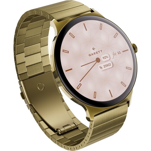 Złoty stalowy smartwatch z okrągłą tarczą, na której widnieje logo "GARETT" oraz wskaźniki: poziom naładowania baterii 92% i liczba kroków 25822. Tarcza ma geometryczny wzór, a bransoleta jest metalowa z zapięciem.