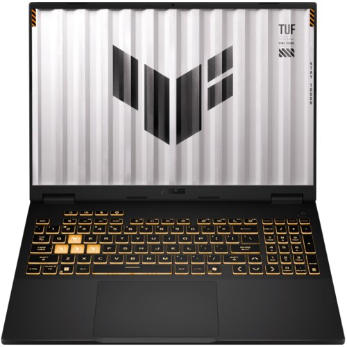 Laptop z otwartym ekranem, na którym widoczne jest logo w kształcie litery "V" oraz napisy "TUF" i "STAY TOUGH". Klawiatura podświetlona na żółto z wyróżnionymi klawiszami WSAD.