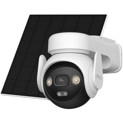 Na zdjęciu znajduje się biała kamera IP zewnętrzna z dwoma widocznymi diodami LED, zamontowana na uchwycie, z panelem solarnym w tle. Na obudowie kamery widoczny jest napis "imou".