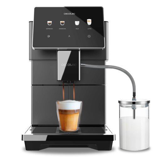 Czarny ekspres do kawy z dotykowym panelem, na którym widoczne są ikony i napisy: "ESPRESSO", "AMERICAN", "MILK", "LATTE". Pod panelem znajduje się wylewka, z której leje się kawa do szklanki z mleczną pianką, a obok stoi pojemnik z mlekiem połączony rurk