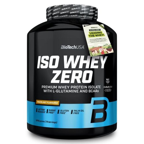 Czarny pojemnik z odżywką białkową marki BioTechUSA, z dużym białym napisem "ISO WHEY ZERO" oraz informacjami o produkcie: "PREMIUM WHEY PROTEIN ISOLATE WITH L-GLUTAMINE AND BCAAs", "HAZELNUT FLAVOURED", "LACTOSE REDUCED", "SUGAR FREE", "GLUTEN FREE", "PA