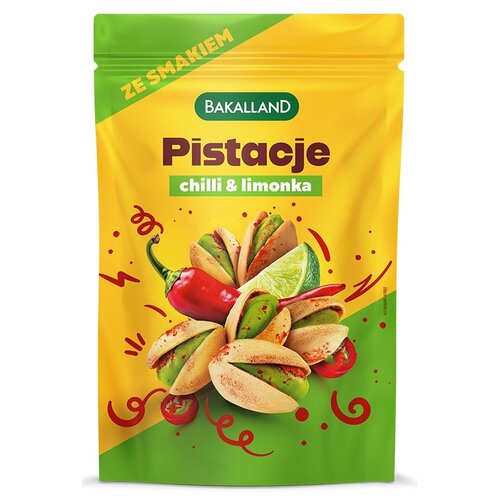 Opakowanie pistacji prażonych marki Bakalland o smaku chilli i limonki, z kolorową grafiką przedstawiającą pistacje, papryczkę chili i limonkę. Na opakowaniu widnieje napis "ZE SMAKIEM" oraz "Pistacje chilli & limonka".
