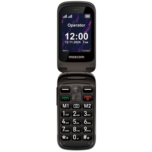 Telefon z klapką marki Maxcom, model MM834 4G, w kolorze czarnym, z wyświetlaczem pokazującym godzinę 12:00, datę 12.11.2024, dzień tygodnia "Tue" oraz napisy "Operator", "Menu" i "Contact". Na klawiaturze widoczne są duże, wyraźne przyciski z cyframi i l
