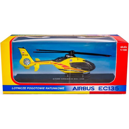 Model helikoptera ratunkowego w skali 1:100 znajduje się w opakowaniu z przezroczystym frontem, umożliwiającym jego pełny widok. Na opakowaniu widnieje tekst: "LOTNICZE POGOTOWIE RATUNKOWE", "AIRBUS EC135", oraz "skala 1:100".