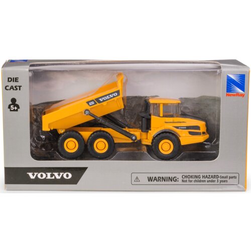 Pudełko z modelem wywrotki w kolorze żółtym, z napisem "VOLVO" na boku, oznaczone jako "DIE CAST" i przeznaczone dla dzieci od 5 lat. Na opakowaniu znajduje się ostrzeżenie: "WARNING: CHOKING HAZARD - Small parts. Not for children under 3 years" oraz logo