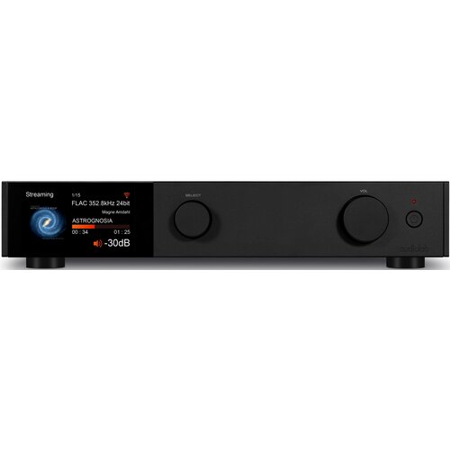 Czarny odtwarzacz sieciowy z wyświetlaczem pokazującym informacje: "Streaming", "1/15", "FLAC 352.8kHz 24bit", "Magro Andanti", "ASTROGNOSIA", czas odtwarzania "00:34" z całkowitego "01:25", oraz poziom głośności "-30dB". Na panelu znajdują się dwa pokręt