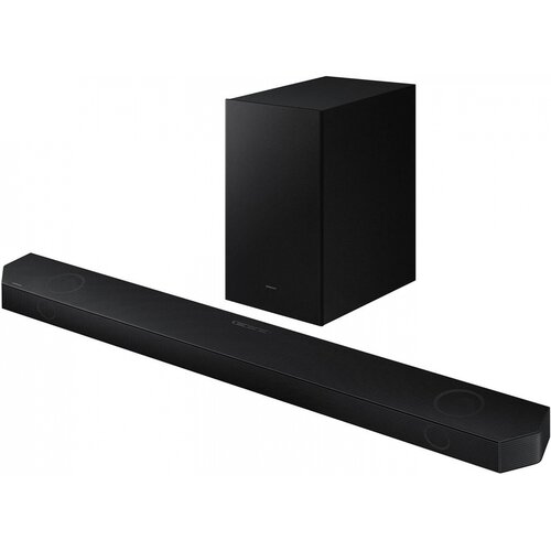 Na zdjęciu widoczny jest czarny soundbar oraz subwoofer. Na obu urządzeniach znajduje się logo "SAMSUNG".