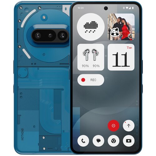 Na zdjęciu widoczny jest niebieski smartfon z wyświetlaczem pokazującym interfejs użytkownika z ikonami i widżetami, w tym kalendarz z datą "11", ikony słuchawek z poziomem naładowania 90%, oraz przycisk oznaczony jako "RED". Na obudowie telefonu widoczne